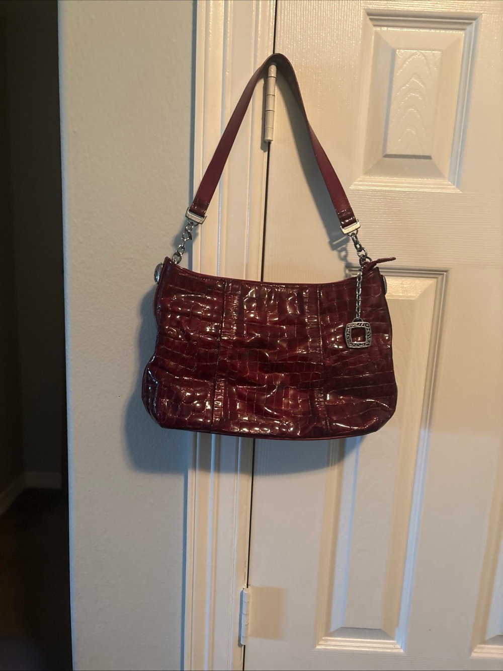 The Brighton Burgundy Croc-Embossed Patent Leather Shoulder Bag..
